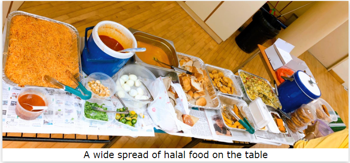 A wide spread of halal food on the table